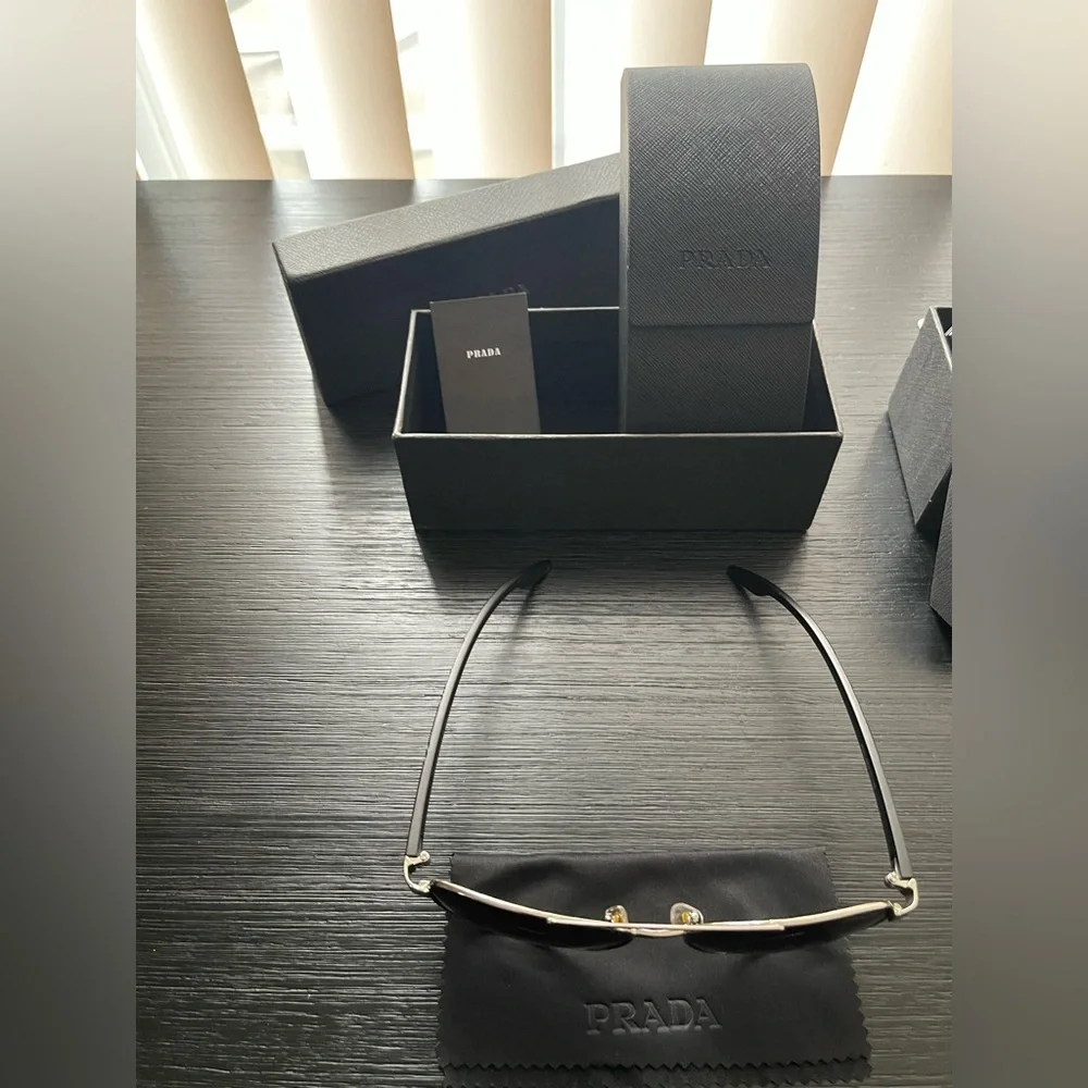 Prada Silver Aviator Sunglasses with Dark Blue and Purple Lenses